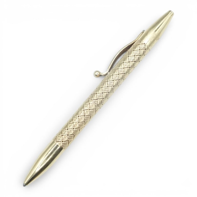 Vintage Tiffany Style 14K Ballpoint Pen: Vintage Tiffany Style 14 Karat Yellow Gold Ballpoint Pen. Stamped. Measures 4". Approx. weight: 14.5 grams. Condition: Good condition. Estimate 1000 - 1500 Domestic shipping Third party