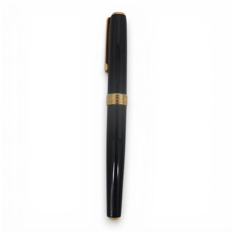 Vintage Diplomat Classic Fountain Pen w/ Gold Nib: Vintage Diplomat Classic Fountain Pen with "M" Gold Nib. Black and gold tone body. Both pen and nib marked appropriately. Measures 5-1/2". No box. Condition: Good overall condition. Some oxidation at