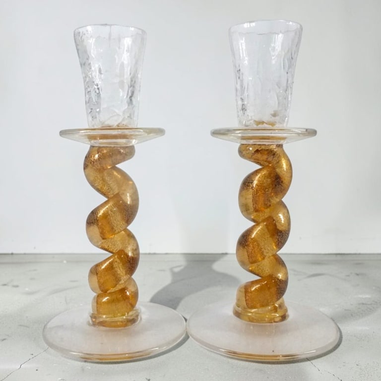 Pair Union Street Gold Spiral Candlesticks: Pair Union Street Gold Spiral Candlesticks. Hand-blown gold flecked spirals, sculptured glass cups. Signed and dated 2003. Measures 6-1/2". Condition: Good condition, no chips or cracks. Estimate 100
