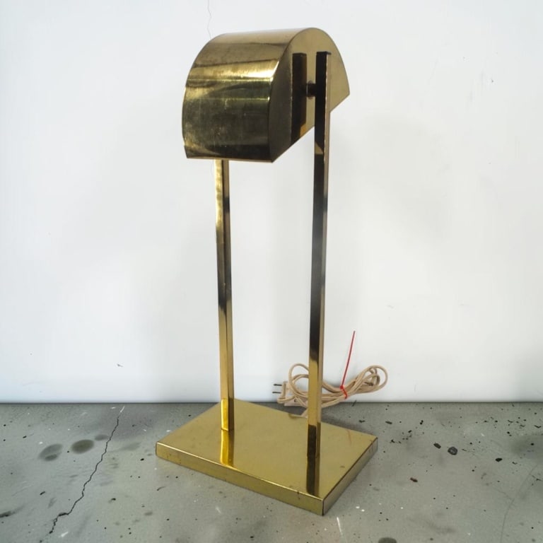 Attrib: George Kovacs Brass Demilune Desk Lamp: Attributed to: George Kovacs, Brass Demilune Desk Lamp. No visible markings. Measures 20" H x 9-1/4" x 6-1/8". Condition: The shade needs tightening,, Light wear from age and use. Estimate 100 - 200
