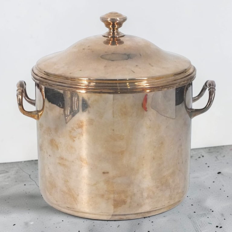 LARGE Christofle Silver Plate Ice/Champagne Bucket: LARGE Vintage Christofle Silver Plate Ice/Champagne Bucket. With strainer and lid. Marked on underside. Measures 11" H x 10-3/4". Condition: Good vintage condition with light wear from age and use.
