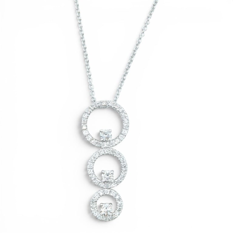 Vintage 14K Diamond Drop Pendant w/ Necklace: Vintage 14 Karat White Gold Diamond Circle Drop Pendant with Necklace. Measures 16" L. Approx. weight: 4.5 grams. Condition: Good condition. Estimate 700 - 1200 Domestic shipping Third party