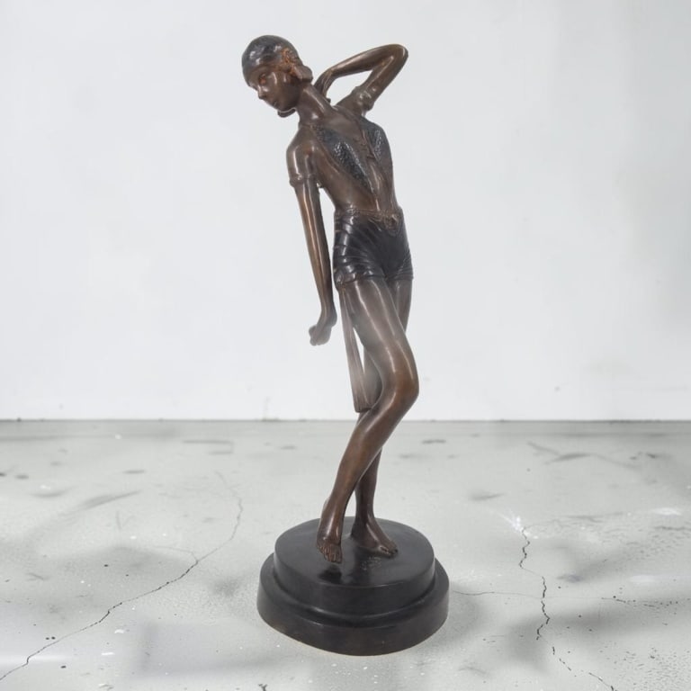 Art Deco Style Patinated Bronze Sculpture "Dancer": After Chiparus Art Deco Style Patinated Bronze Sculpture "Dancer". Unsigned. Measures 13" H. Condition: Light wear to patina or in good condition consistent with age. Estimate 100 - 300 Domestic