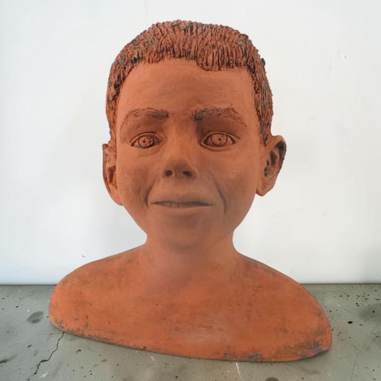 Large Terracotta Bust of a Young Boy, 1991: Large Terracotta Bust of a Young Boy. Signed and dated D.M. 3.91. Measures 12-1/2" x 12-1/2" x 7". Condition: Good condition. Estimate 500 - 1000 Domestic shipping Third Party