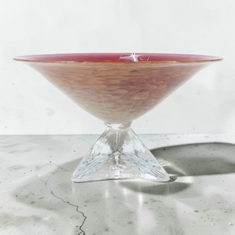 Willsea O'Brien Art Glass Footed Centerpiece Bowl: Willsea O'Brien Art Glass (Paul Willsea & Carol O'Brien) Footed Centerpiece Bowl. Mottled red glass bowl atop a clear base. Signed. Measures 6-1/4" H X 10-3/4" W. Condition: Good condition with no chi