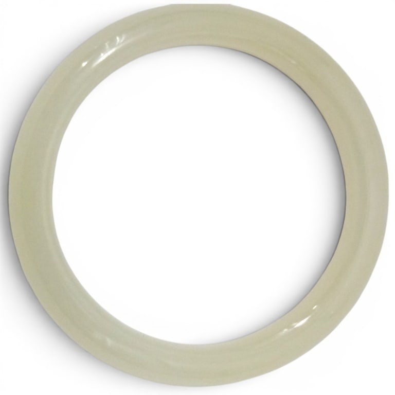 Chinese White Jadeite Bangle: Chinese White Jadeite Jade Bangle. White with a yellow hue. Unsigned. Measures 2-1/4" at opening x 3/4" thick, weighs approx. 71 grams. Condition: Good condition. Estimate 400 - 600 Domestic shipping