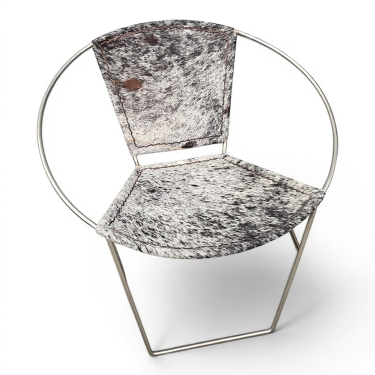 Mnnr: Joseph Cicchelli Chair: Manner of Joseph Cicchelli Steel and Cowhide Upholstered Chair. Condition: Minor oxidation the frame. Upholstery in good condition. Estimate 100 - 300 Domestic shipping Third party