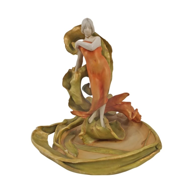 Amphora Art Nouveau Porcelain Water Nymph: Amphora Art Nouveau Porcelain Water Nymph. Impressed Amphora mark to bottom. Measures 8-1/2" H x 8" W. Condition: Good condition. Estimate 300 - 500 Domestic shipping Third Party