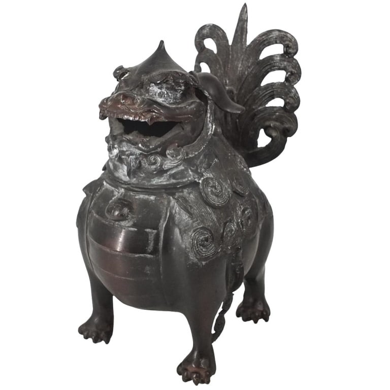 Early 20th C. Chinese Incense Sculpture: Early 20th Century Chinese Bronze Foo Dog Incense Sculpture. Unsigned. Measures 9-5/8" x 5-1/8" x 7-1/4". Condition: Scuffs to the interior side of the bowl otherwise good condition. Estimate 100 -