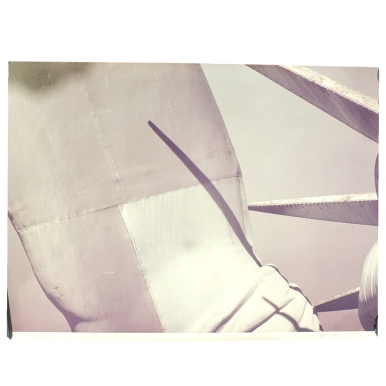 Ruffin Cooper Jr Chromogenic Photograph "Arm": Ruffin Cooper Jr Chromogenic Photograph "Arm (Statue of Liberty)". Signed, AP and dated 1979. Measures 34" x 48". Condition: A few minor edge tears or in good condition. Estimate 160 - 320 Domestic