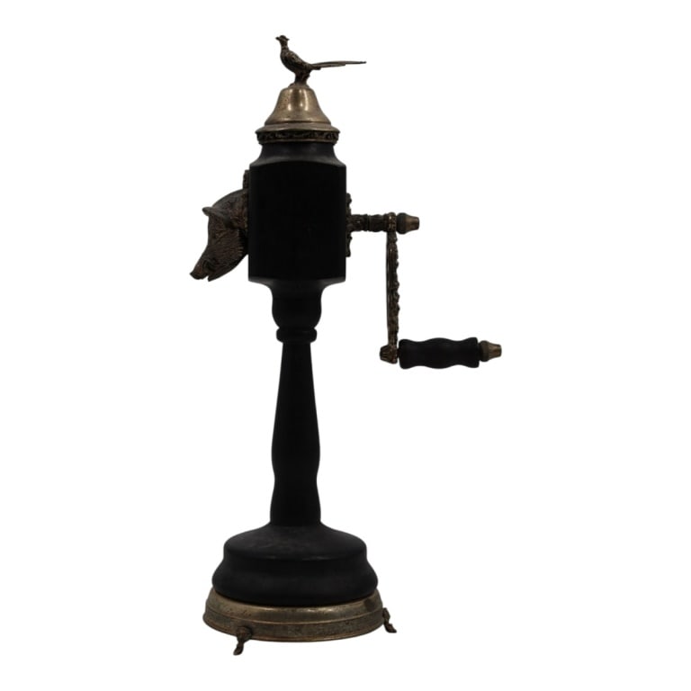 Vintage Reuge Pepper Mill / Music Box: Vintage Reuge Pheasant and Boar Pepper Mill / Music Box. Labeled on the base. Measures 11" H. Please note; we do not guarantee the working order of the musical components. Condition: Running