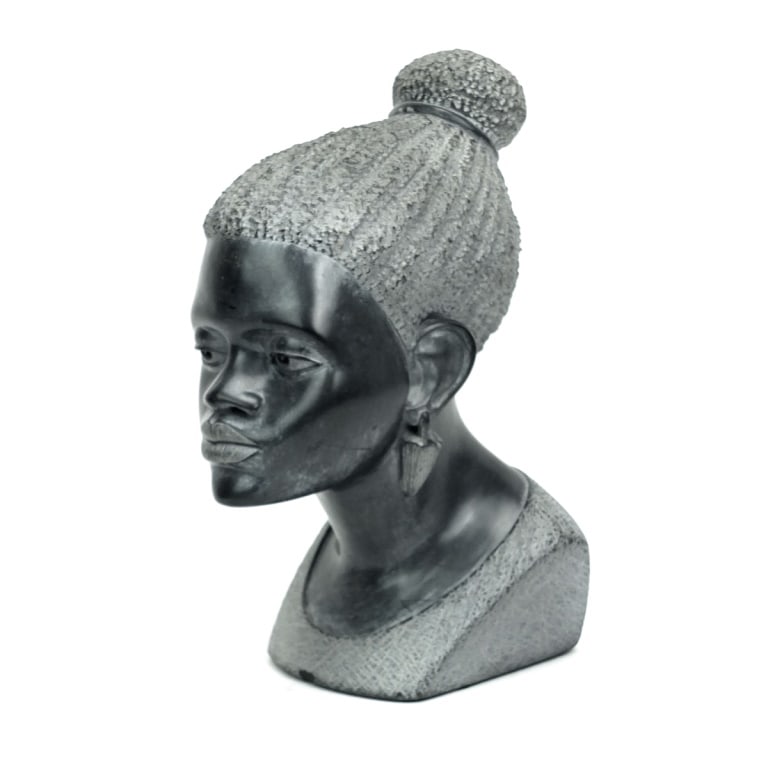 African Carved Hand Carved Stone Bust: Large African Hand Carved Stone Bust of a Female. Signed. Measures 10-1/2" x 7-1/2". Condition: Good condition. Estimate 50 - 150 Domestic shipping Third party