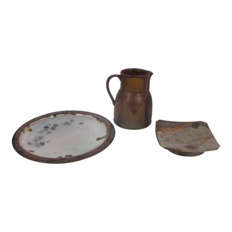 Grouping of Studio Art Pottery Tableware: Grouping of Three Vintage Studio Art Pottery Tableware. Makers: Iron Mountain, others are signed illegibly. Pitcher measures 7-3/4" x 5-3/4". Charger measures 13-1/8". Condition: All in good