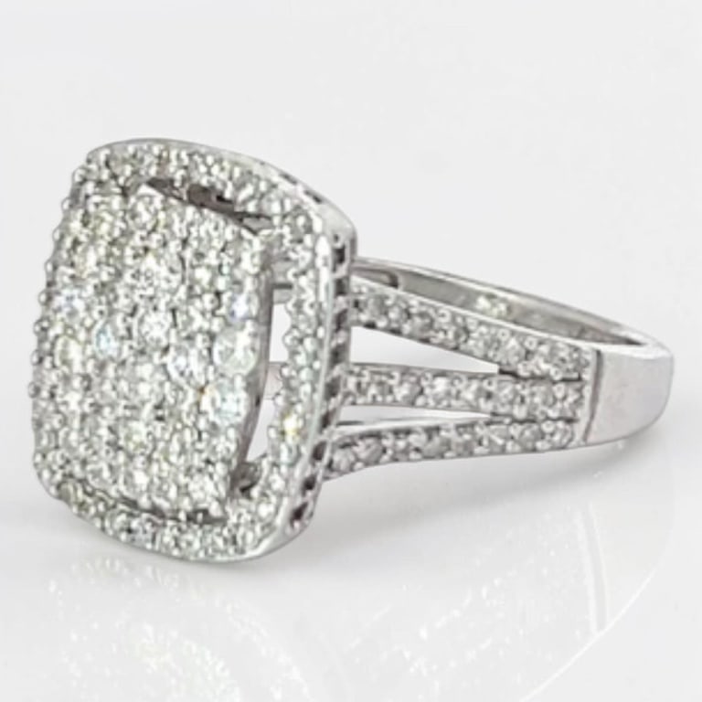 Vintage 18K Diamond Ring: Vintage 18 Karat White Gold Diamond Pave Ring. Diamonds: approx. 1.00 ct G SI1, round brilliant, pave set. Size: 6 Approx. weight: 4.6 grams. Condition: Good condition. Estimate 800 - 1200 Domestic
