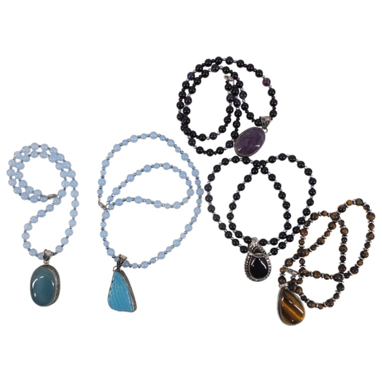 Grouping of Vintage Semi Precious Beaded Necklaces: Grouping of Five Vintage Semi Precious Beaded and Silver Necklaces. Stamped. Longest measures 23-1/2" Long. Shortest measures 19-1/2" Long. Condition: Good condition. Estimate 100 - 400 Domestic