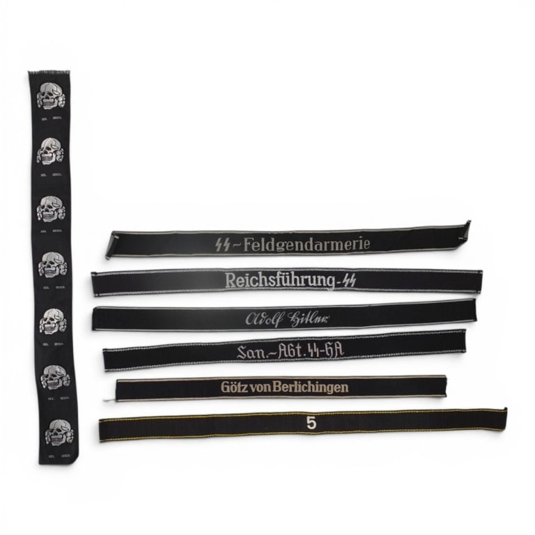 (7) German WWII SS Cuff Titles: (7) German WWII SS Cuff Titles. Machine embroidered fabric. 2 with original labels. Please note; this item has not been authenticated by a third-party expert. The seller makes no guarantees regarding
