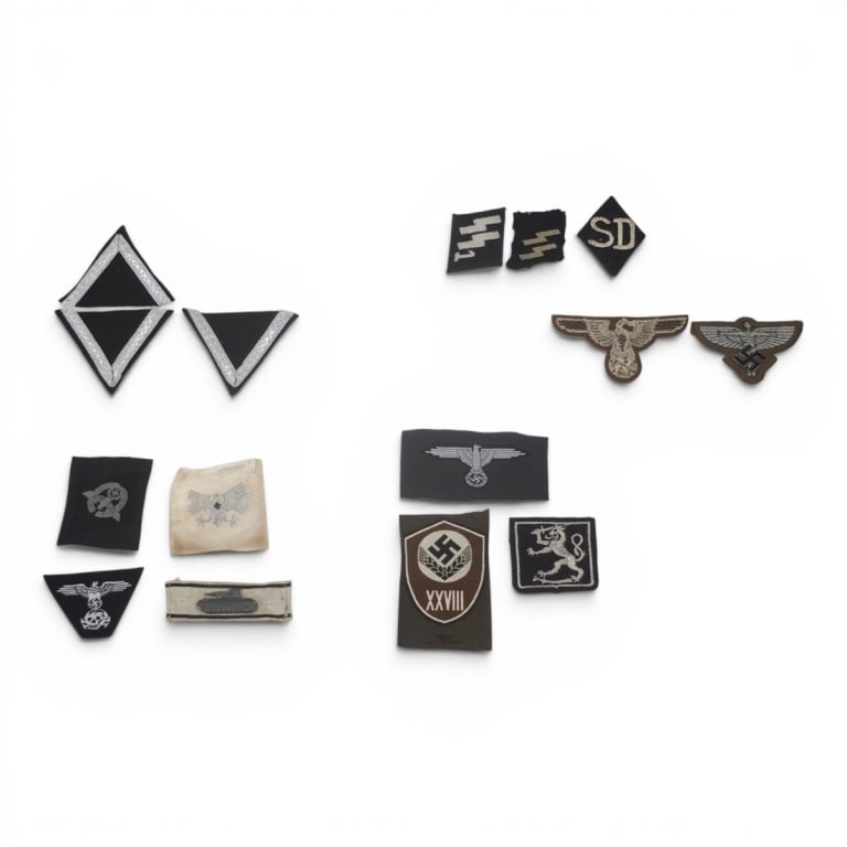 German WWII 15 Pc Collection of Patches, Insignia: German WWII 15 Piece Collection of Patches and Uniform Insignia. Includes Wehrmacht eagle patches, Waffen SS rune insignia and various collar tabs. Please note; this item has not been authenticated
