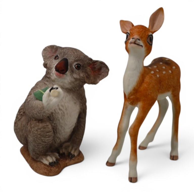 Boehm Porcelain Koala Bear & Fawn Figurines: Boehm Porcelain Koala Bear & Fawn Figurines, 1990. Stamped. Koala measures 5-1/4" H, the fawn 6-1/2" H. Condition: Examined under black light, tiny flake on koala base or in good condition. Estimate