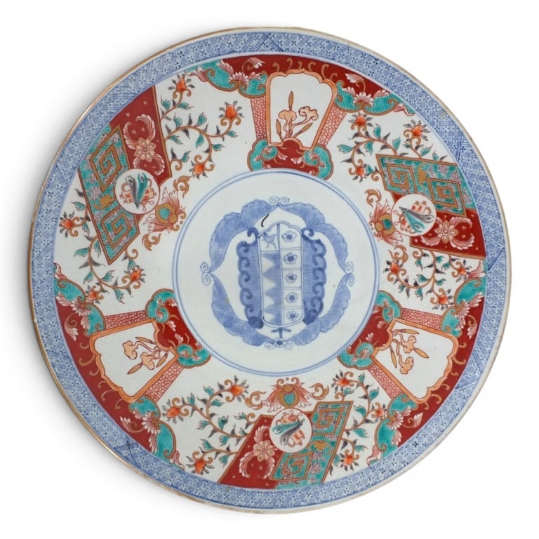 19C Japanese Imari Porcelain Charger: 19th Century Japanese Imari Porcelain Charger. Features a blue center medallion. Signed. Measures 16" diameter. Condition: Crazing, light wear to edges consistent with age. Estimate 100 - 200