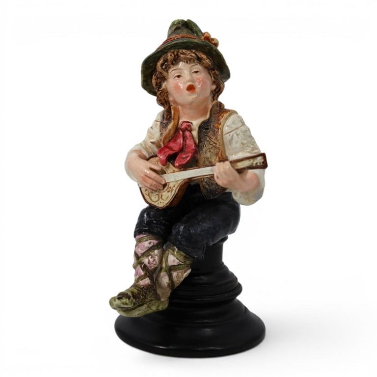 Vintage Italian Porcelain Figure "Mandolin Boy": Vintage Italian Porcelain Figure "Mandolin Boy" on Base. Unsigned. Measures 12" including base. Condition: Overall good condition consistent with age. Estimate 40 - 80 Domestic shipping Third Party
