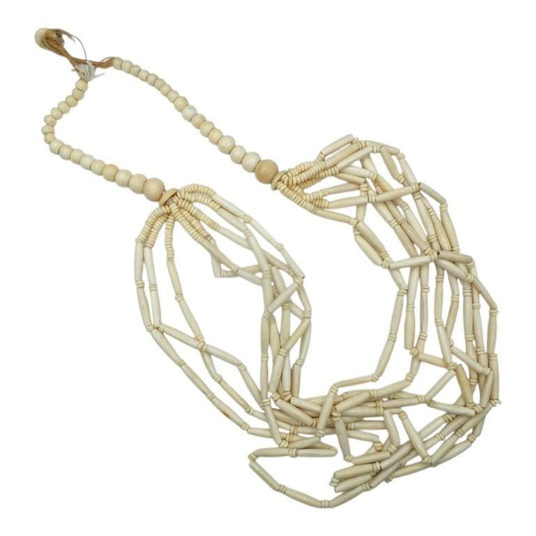 Vintage Carved Bone Bead Statement Necklace: Vintage Carved Bone Multi-Strand Bead Statement Necklace. Measures 20". Please note; this lot contains material which may be subject to state or import/export restrictions. Condition: Good vintage con