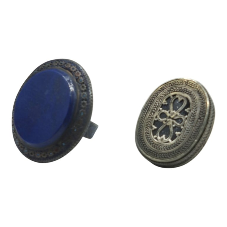 2 Vintage Afghan & Kakakh Tribal Rings: Includes: Large flat lapis and silver ring, size 8. Measures 2" diameter. Kazakh Tribal ring, size 8. Condition: Good condition. Estimate 100 - 200 Domestic shipping Third Party