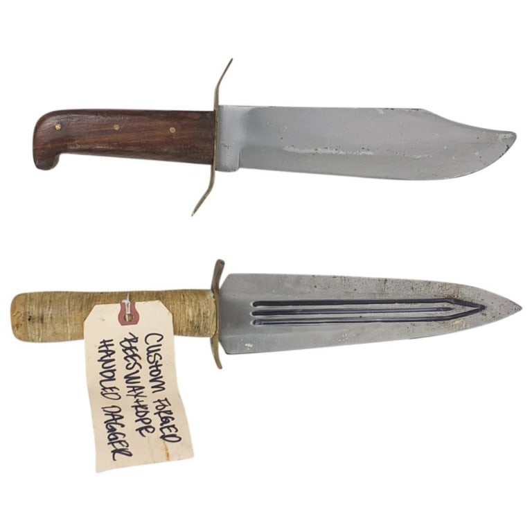 (2) Vintage Fixed Blade Knives: (2) Vintage Fixed Blade Knives. One with Beeswax Rope Handle the other is marked Pakistan. Longest Measures 15-3/4". Condition: Good vintage condition. Estimate 40 - 120 Domestic shipping Third Party
