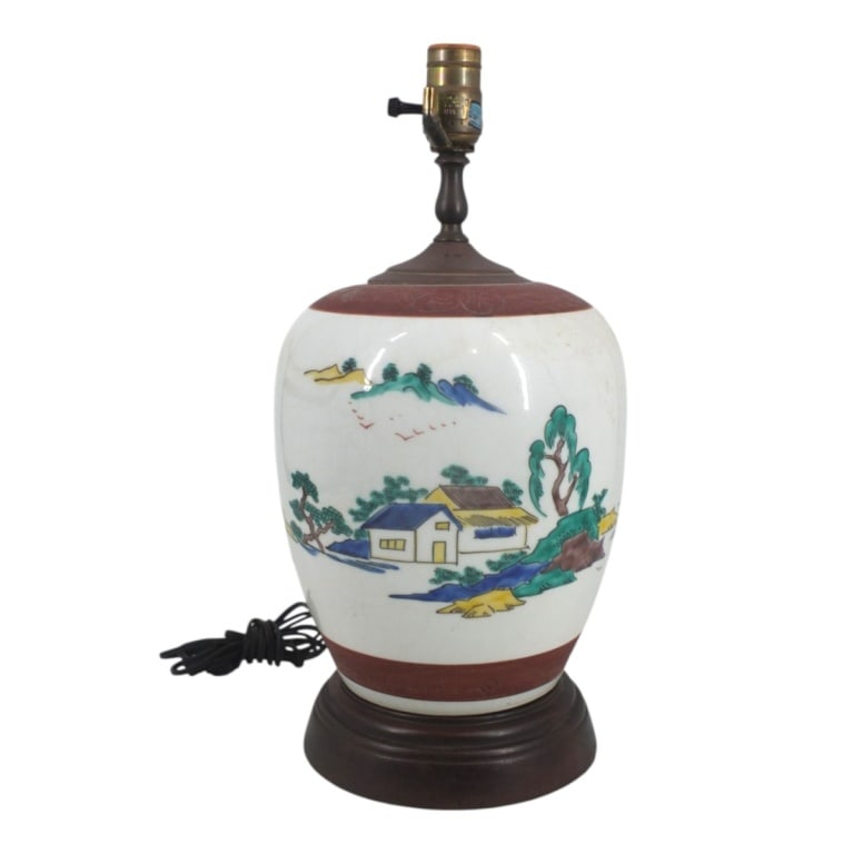 Mid Century Chinese Porcelain Table Lamp: Mid Century Chinese Porcelain Table Lamp. Decorated with a landscape motif. Unsigned. Measures 17: to top of socket x 9" W. Condition: Good condition consistent with age. Estimate 50 - 150 Domestic