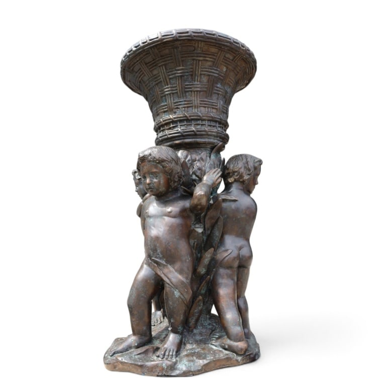 Vintage Maitland-Smith Patinated Bronze Jardiniere: Vintage (late 20th C) Maitland-Smith Patinated Bronze Figural Jardiniere. Features a trio of sculptural putti holding up a basket-weave urn. No visible mark. Measures 40" H x 19" x 19". Condition: Goo