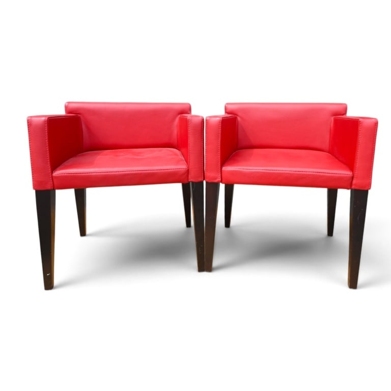 Pair of Zientte Designer Armchairs: Pair of Designer Red Leather Armchairs by Zientte. Measures 28" x 23-1/2" x 20-1/2", 18" seat height. Condition: One chair has a small area with wear to the leather on the right side panel. Estimate 3