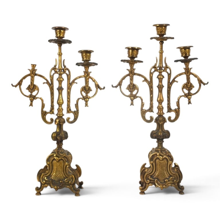Pr Vintage French Rococo-style Bronze Candelabra: Pair Pr Vintage French Rococo-style Bronze 3 Light Candelabra. Features scrolling acanthus leaf arms and heavy base. Unsigned. Measures 17" H x 9-1/2" x 4". Condition: 1 candleholder/bobeche has come