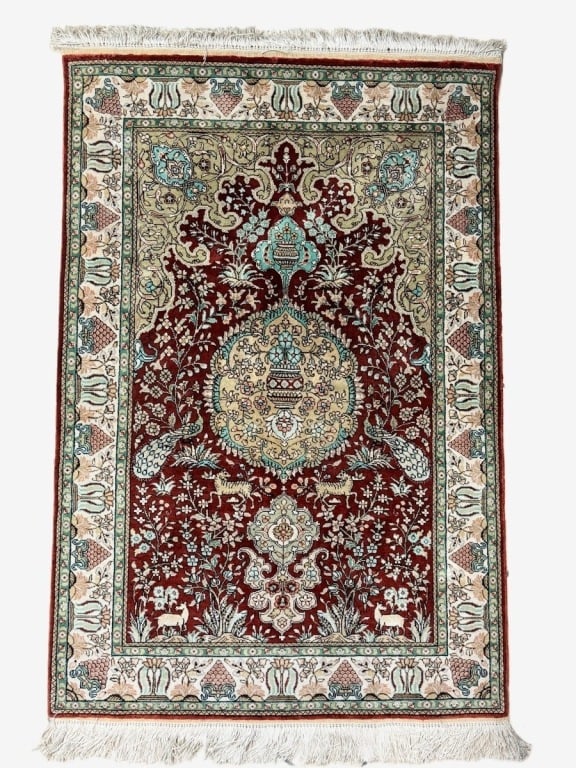 Vintage Persian Silk Prayer Rug 25" x 37": Vintage Persian Silk (Qum?) Prayer Rug. Features a traditional hunting or garden motif with animals and a central medallion. Unsigned. Measures 25" x 37". Condition: Good pre-owned condition. Would