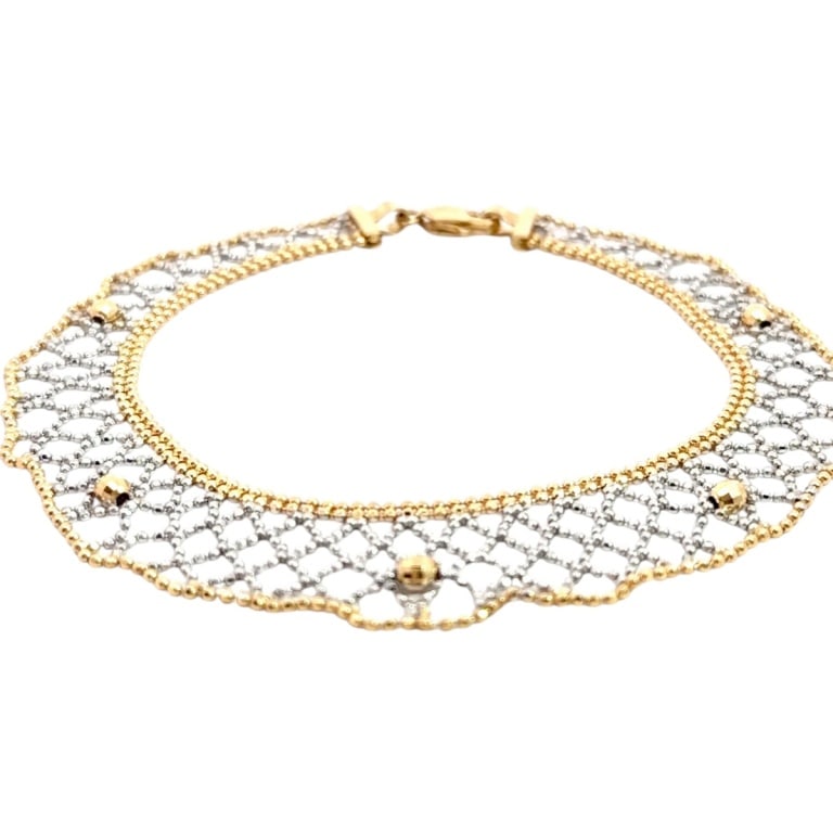Vintage 14K Two Tone Mesh Bracelet: Vintage 14 Karat Yellow Gold Two Tone Diamond Cut Beaded Mesh Bracelet. Condition: Good condition. Estimate 900 - 1200 Domestic shipping Third party
