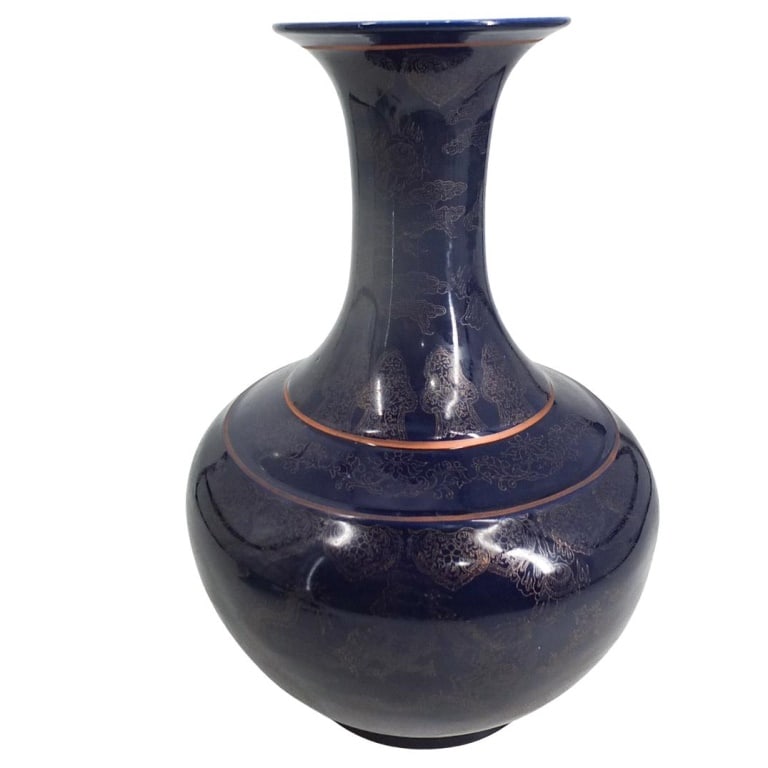 Large Chinese Porcelain Vase: Large Chinese Blue Glazed Porcelain Vase with Flaming Pearls and Dragon Relief. Unsigned. Measures 16-3/4" x 11-1/2". Condition: Rubbing to the surface otherwise good condition. Estimate 100 - 200 Dom