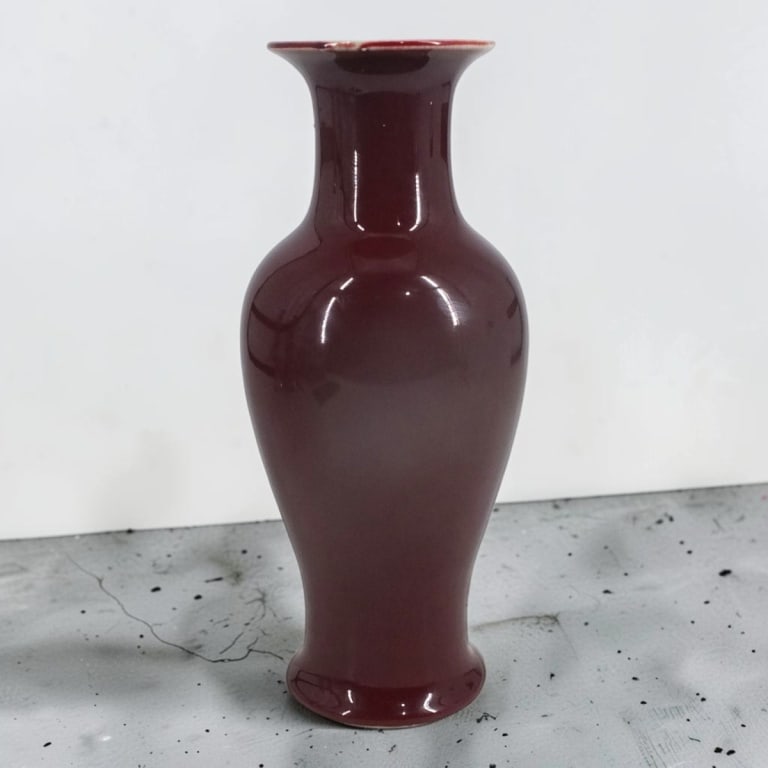 Chinese Republic Sang de Boeuf Porcelain Vase: Chinese Republic Period Sang de Boeuf Porcelain Vase. Signed with blue under glaze stamp and original paper label. Measures 12" H. Condition: Good condition. Estimate 400 - 600 Domestic shipping Third