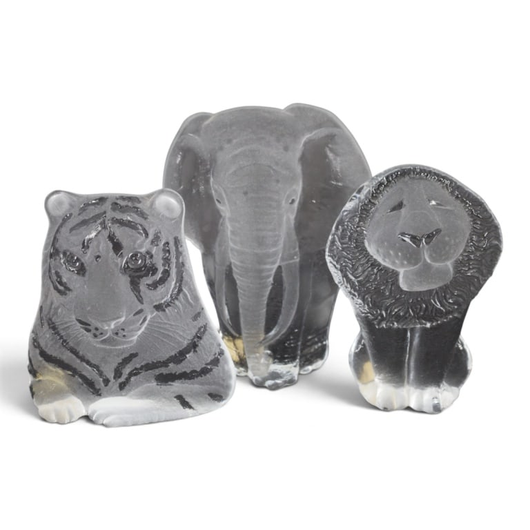 3 Royal Krona Mats Jonasson Glass Animals: 3 Royal Krona Mats Jonasson Glass Animal Sculptures. Includes elephant 8" H, tiger 6", lion 6-3/4". Original labels, etched signature. Condition: A couple of tiny chips on lion's paws or in good