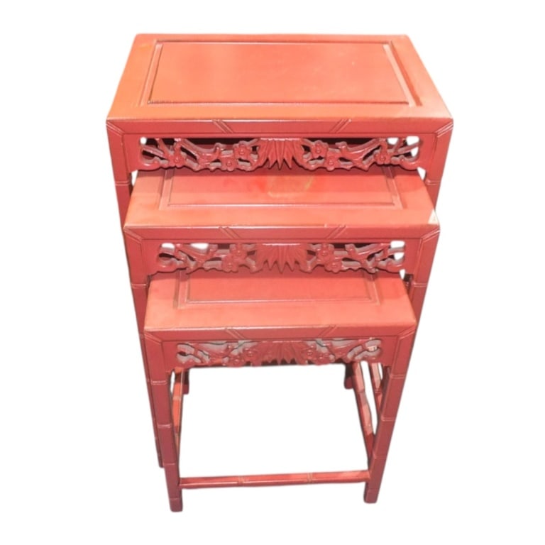 Set of Chinese Wooden Nesting Tables: Set of Three Chinese Red Painted Wooden Nesting Tables. Tallest measures 26-3/8" x 20" x 14". Smallest measures 15-1/4" x 18" x 12". Condition: Middle table has blemish to the top. Estimate 100 - 300 