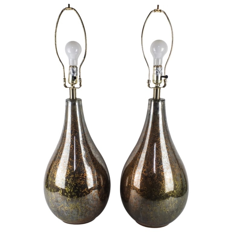 Pair of Modern Glass Lamps: Pair of Modern Reverse Painted Glass Lamps. Overall measures 32". Base Measures 19-1/4" x 10". Condition: Good Condition Estimate 50 - 150 Domestic shipping Third party