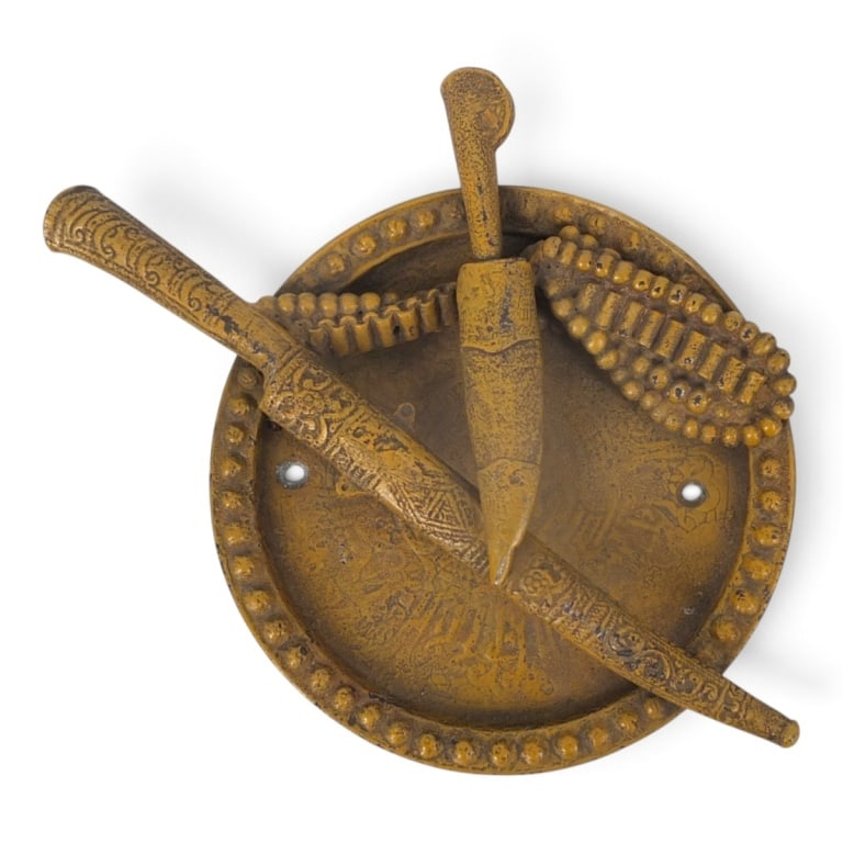 Vintage Dhal Talwar Metal Wall Plaque: Vintage Dhal Talwar Metal Wall Plaque. Unsigned. Measures 13-1/2" x 9". Condition: Wear, rubbing consistent with age, display and storage. Two drill holes for hanging Estimate 50 - 100 Domestic