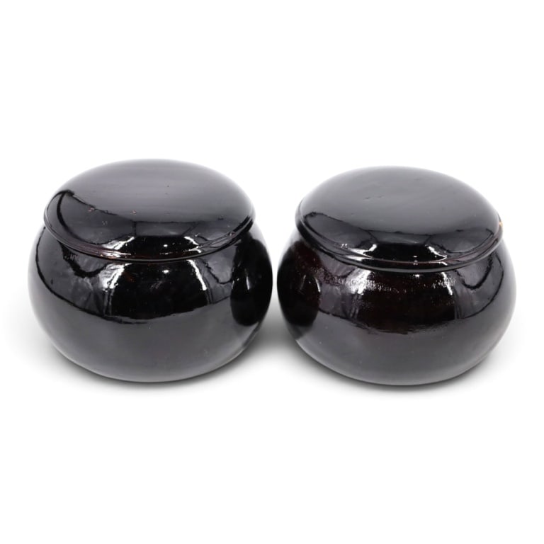 Two Round Black Lacquer Lidded Bowls: Two Round Black Lacquer Lidded Bowls. Unsigned. Measures 4" H x 6" diameter. Condition: 1 with crack and repair. Estimate 40 - 60 Domestic shipping Third Party