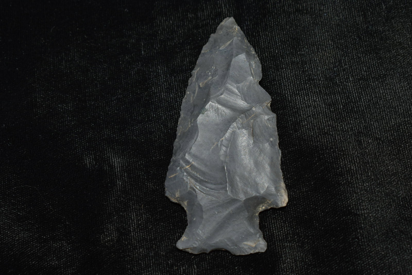 3 1/8" Vosberg Arrowhead: 3 1/8" Vosberg Arrowhead made of hornstone found in Warren County, Ohio by James Miracle. James hunted sites about one mile from the famous Fort Ancient Site. Ancient Arrowhead Indian Artifact