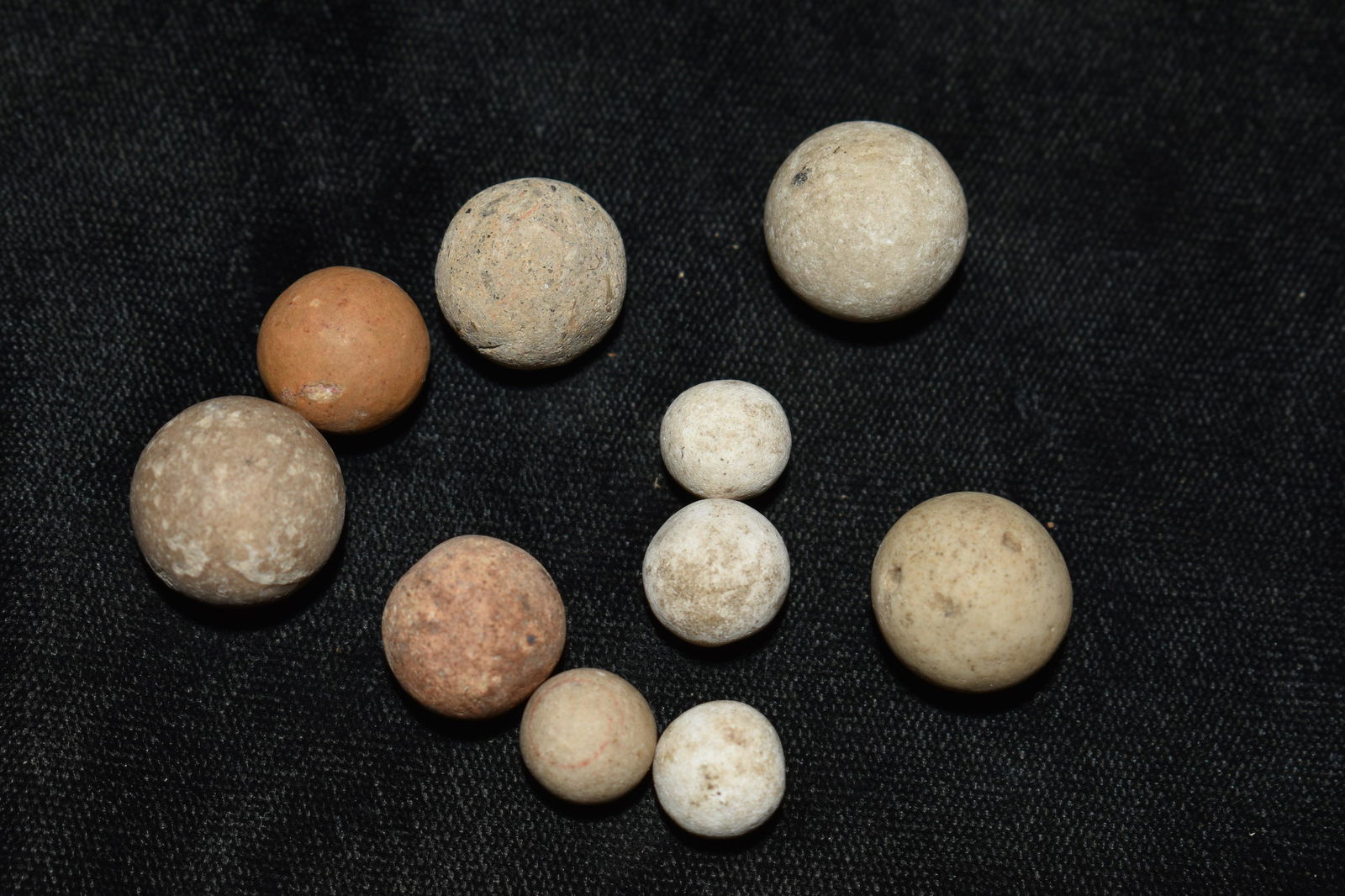 Group of 10 1800's Marbles: Group of 10 1800's Marbles. Some may be older indian game balls. All are in vrey good condition for their age. Sizes range from 3/8" to 1/2"