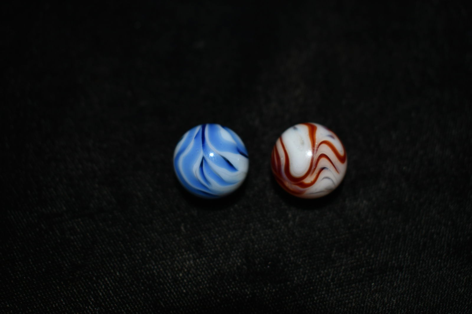 2 Outstanding Alley Agate Marbles: 2 Alley Agate Marbles with A lot of Flames. Both of these are in Fine condition. No hit marks from game play. Both are 5/8"