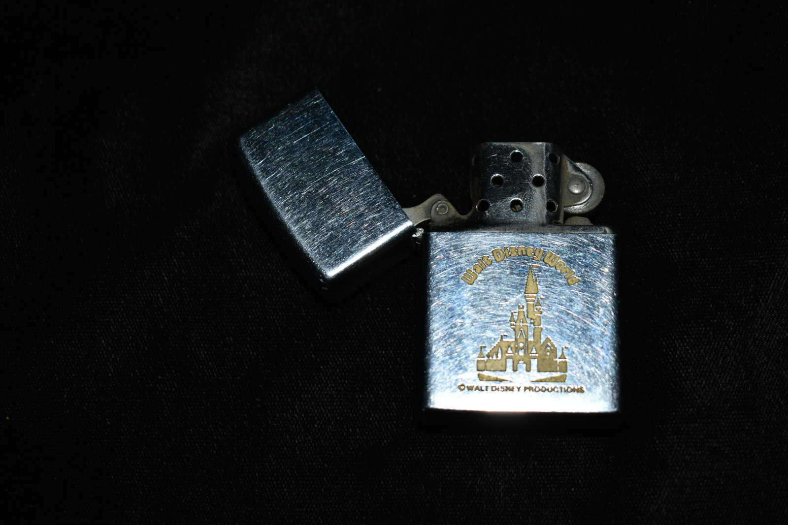 1973 Walt Disney Zippo Lighter: 1973 Walt Disney Bradford Zippo Lighter. This Zippo is in great condition. It still has its wick and the sparker still rolls like it should. Couldn't get it to light though. 2 1/4" Tall