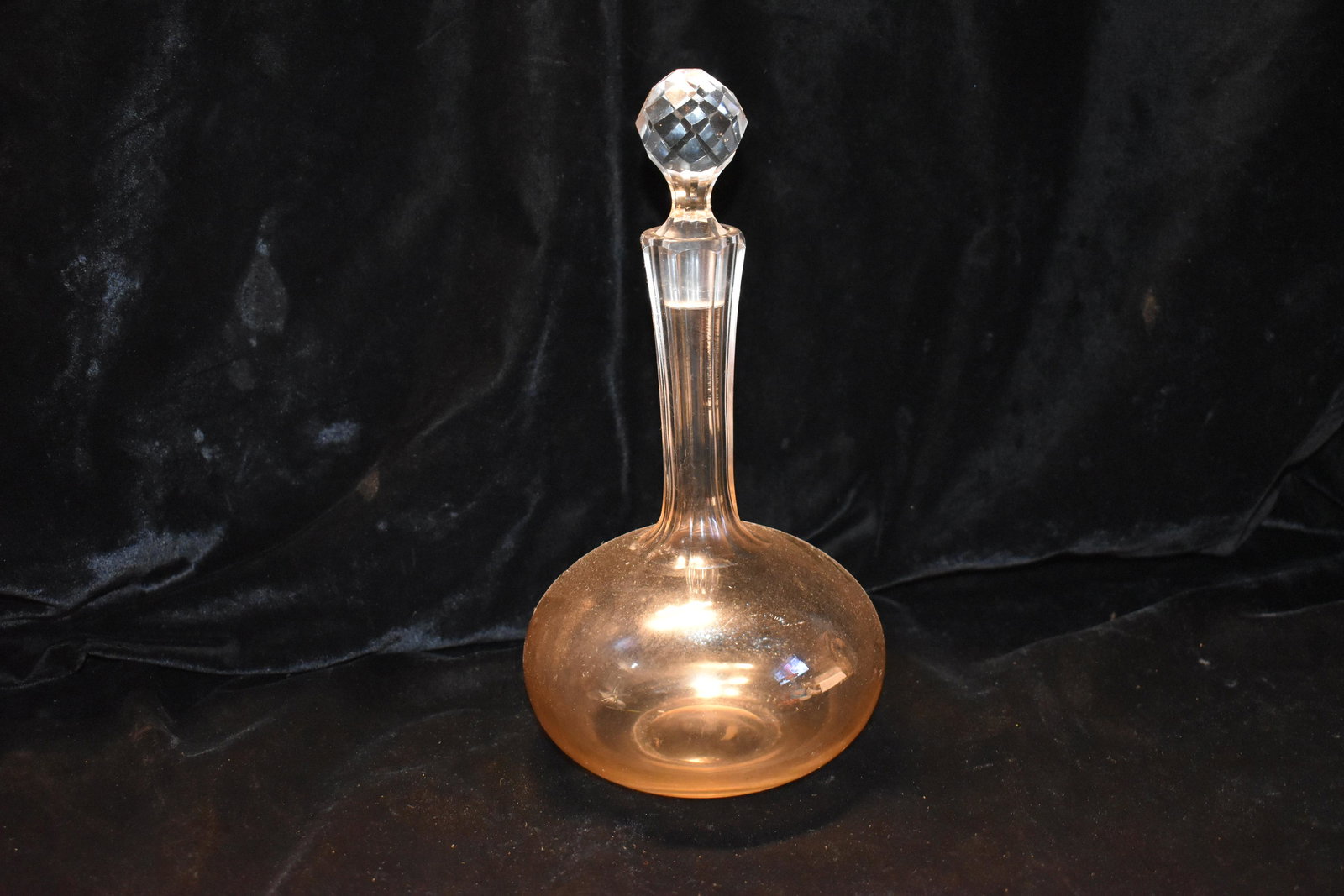 1800's Liquor Decanter or Potion Flask: 1800's Liquor Decanter or Potion Flask. This piece has character. Appears handblown with no seams and astem with stopper that show the cut marks where it was honed to its final form. No visible makers