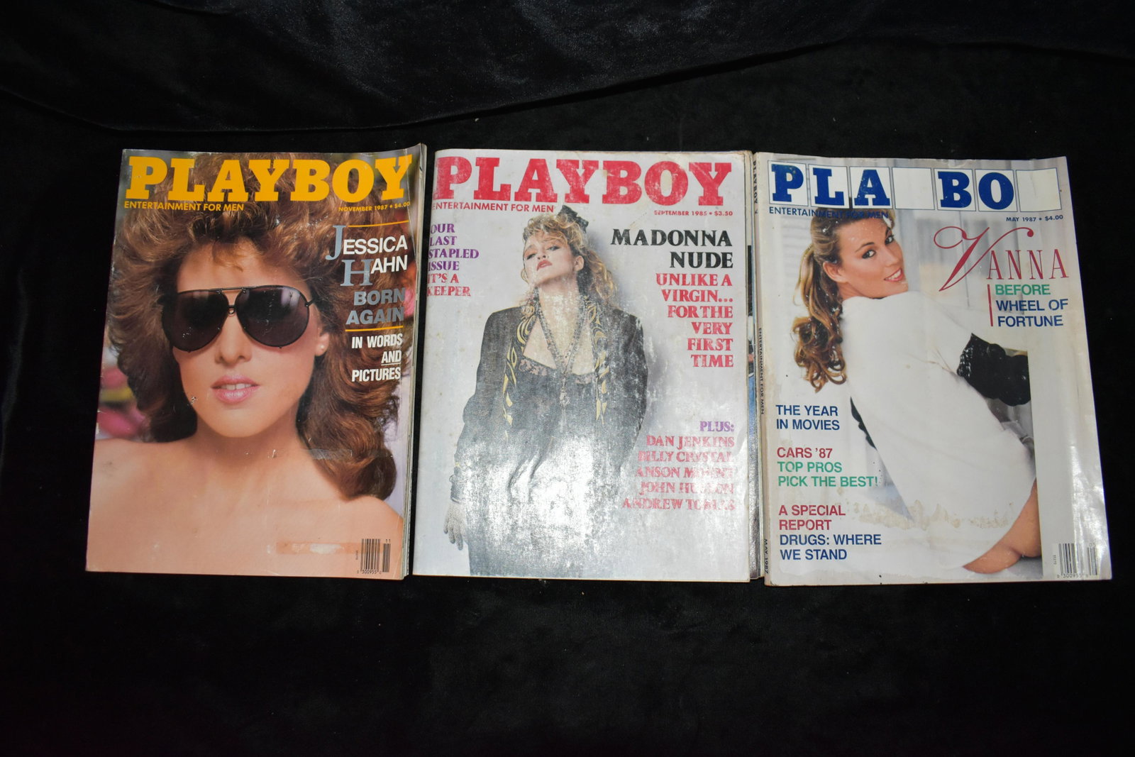1980's Playboy Magazines: Lot of 5 1980's and one 1997 Playboy Magazines. Some of the noted highlights in this lot are Jessica Hawn, Vana White before Wheel of Fortune and Madonna. All are in good condition with a bit of wear 
