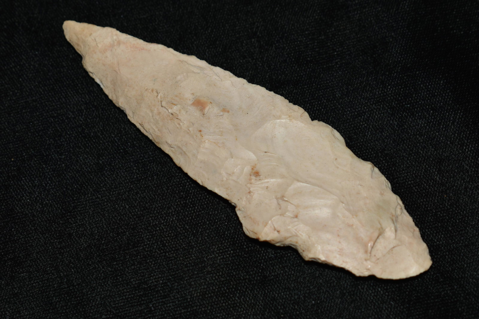 4 1/8" Beveled and Notched Ovoid Knife: 4 1/8" Beveled and Notched Ovoid Knife found in St. Louis County, Missouri. From the lifetime collection of Dale Williams.