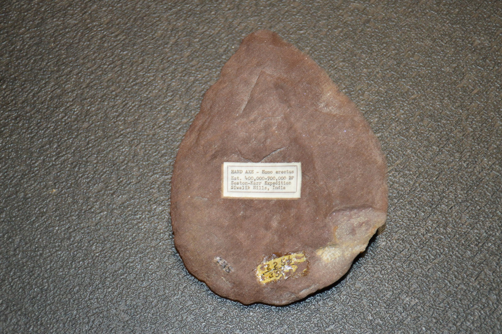 4 3/4" Hand Axe: Found in Siwalik Hills, India. Seaton-Karr Expedition. Estimated 400,000 years old. Ex: John Greenawalt Collection.