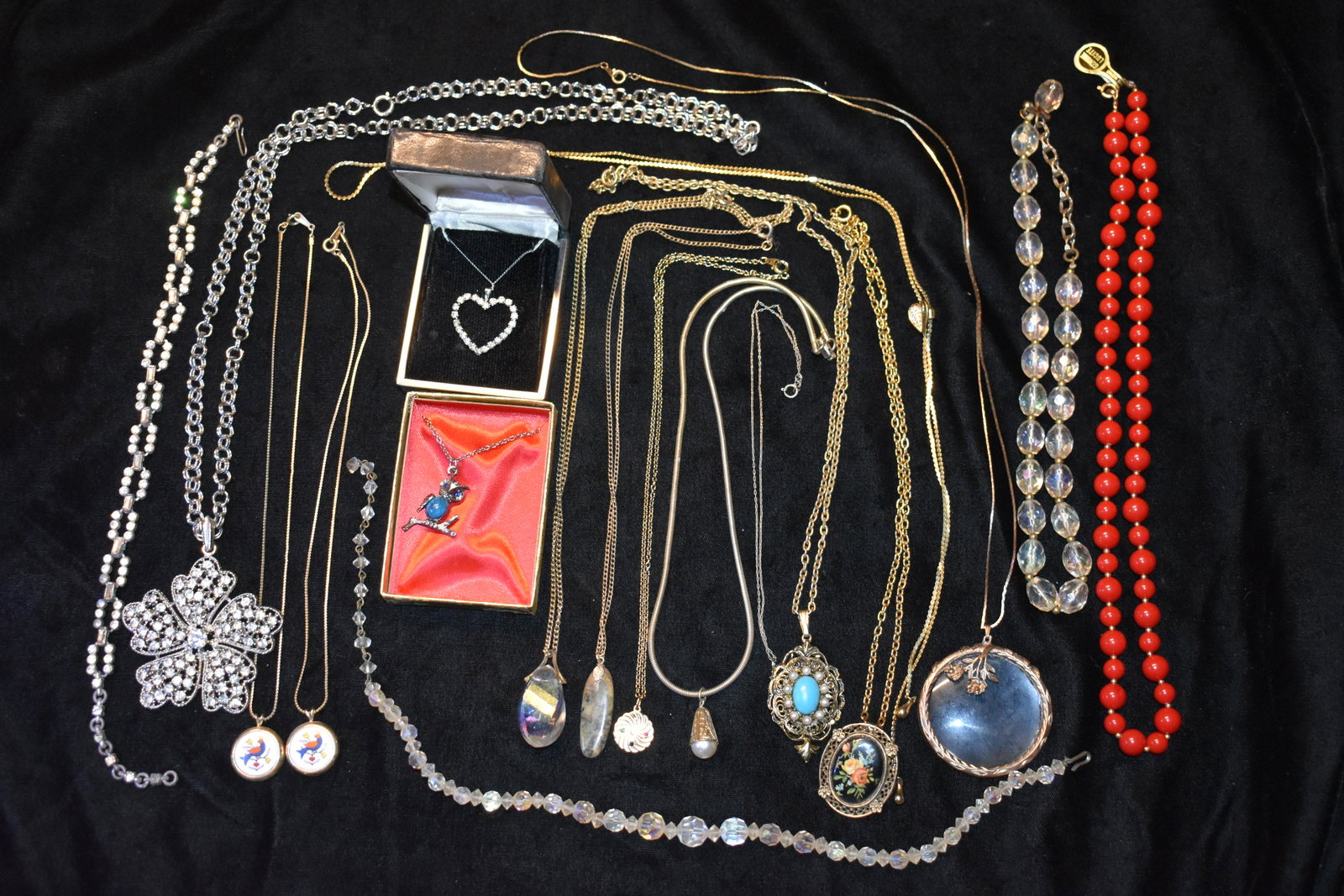 Group of 17 Vintage Necklaces: This lot consists of 17 necklaces or chokers from mid 1900's to late 1900's. Most are in excellent condition. The oldest one is missing 2 or 3 rhinestones. Most have no manufacturer data on them. One 