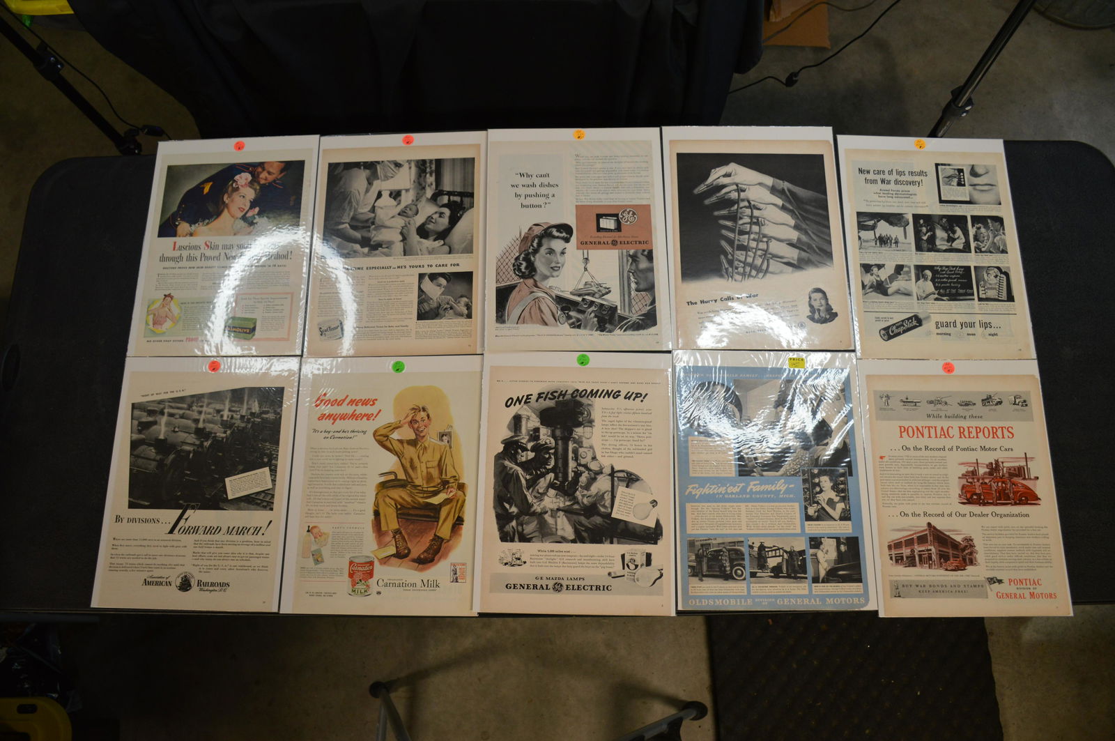 10 Advertisement Pages Military Related: Miscellaneous group from the 40's , 50's and 60's. General Electric , Oldsmobile , Bell Telephone , Pontiac , Etc.